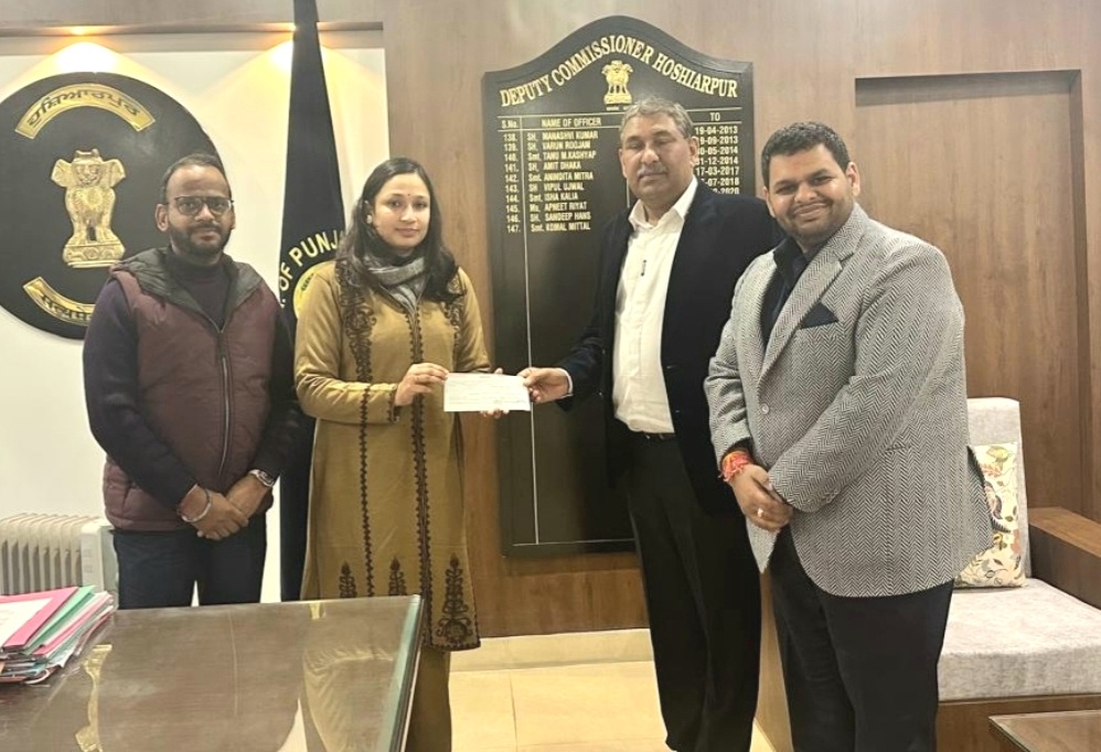 Cambridge International School contributed cash to District Red Cross Society's Wings Project